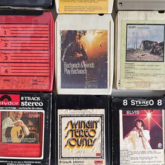 Vintage 8 track tapes + storage rack